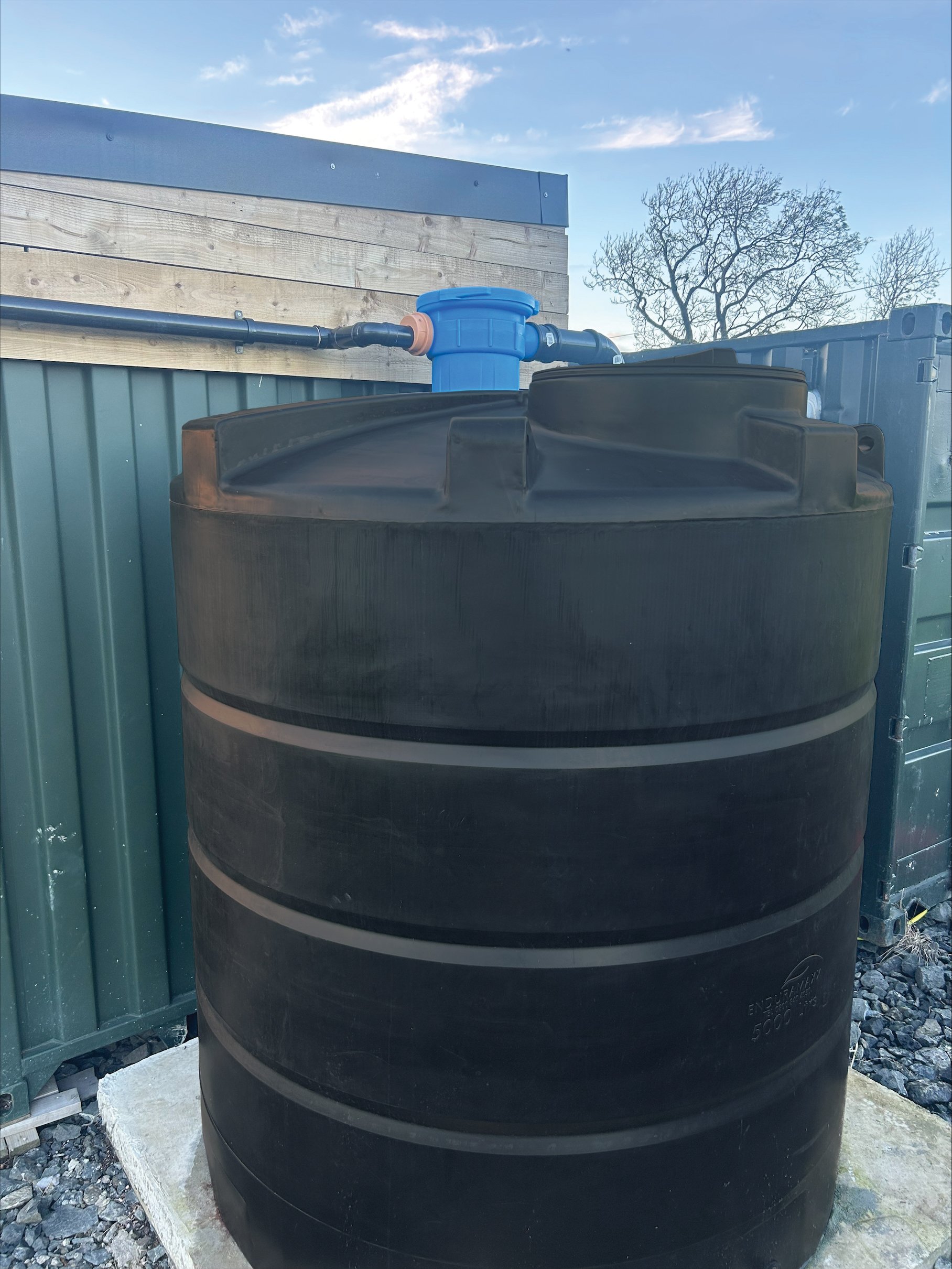 Enduramaxx's rainwater harvesting kit, hooked up to an off-grid house